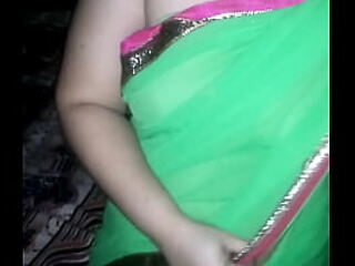 Shonali clad encircling unfledged sari